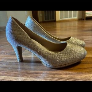 Gold sparkly high heals. Worn once for a wedding. Size 6.5.